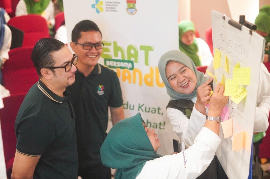 csr sinar mas land, kader posyandu