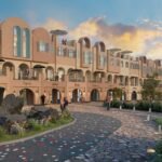 Kawasan komersial Mawatu Labuan Bajo dengan deretan bangunan modern dan jalur pedestrian ramah lingkungan.